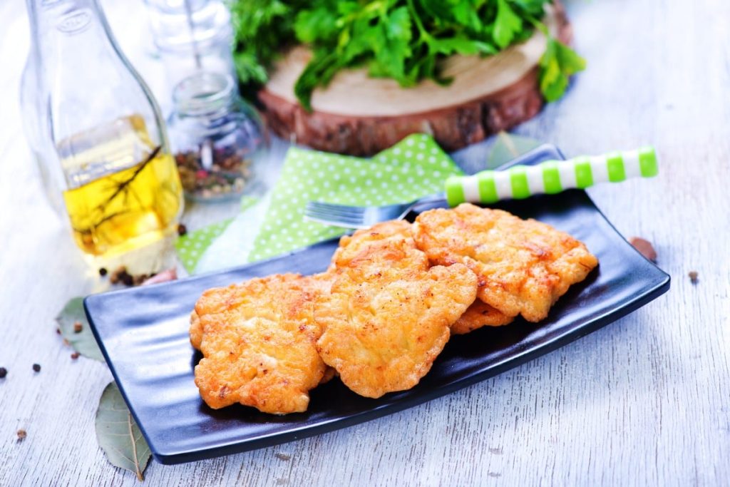 Panierte Hähnchenschnitzel mit Ingwer im Ofen