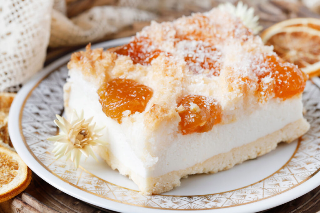 Fruchtig und Exotisch Käsekuchen mit Aprikosen und Kokos